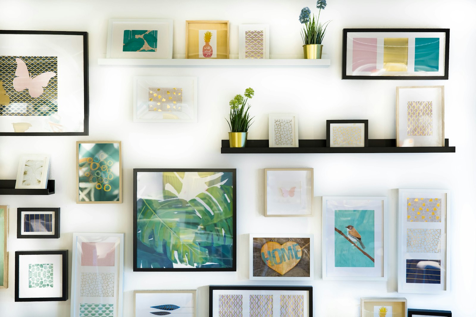 Styled shelving with framed art and objects