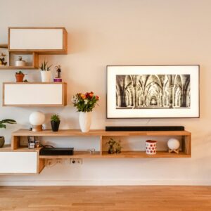 Wall-mounted walnut media console with open shelving