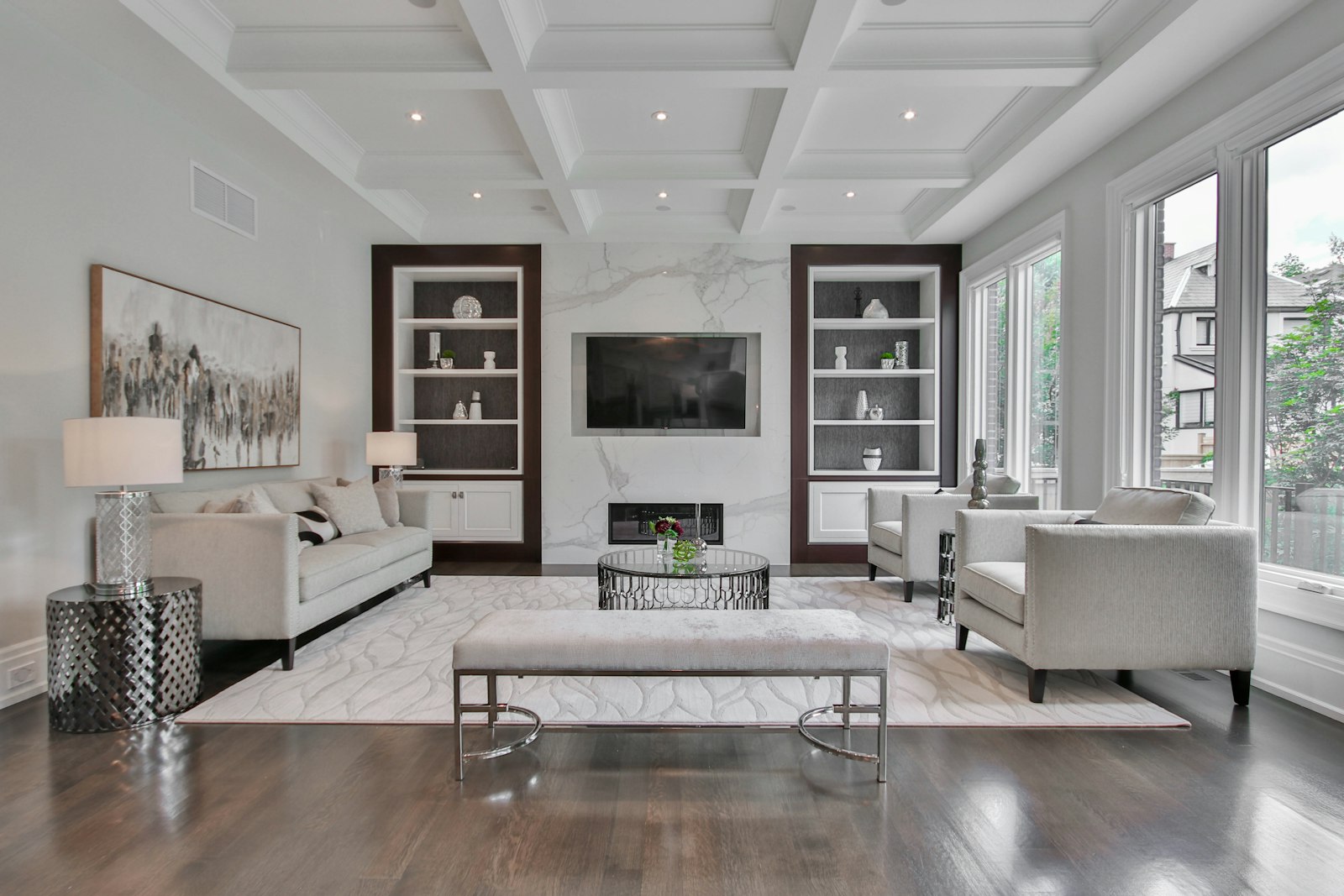 Elegant living room with a fireplace and built-in shelving