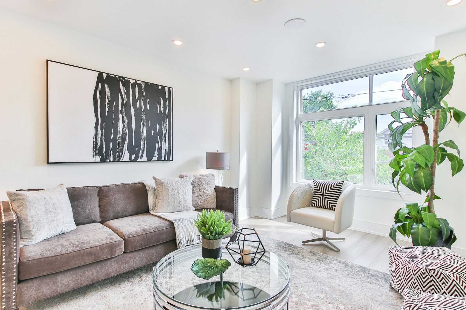 Dining and living space with a glass table